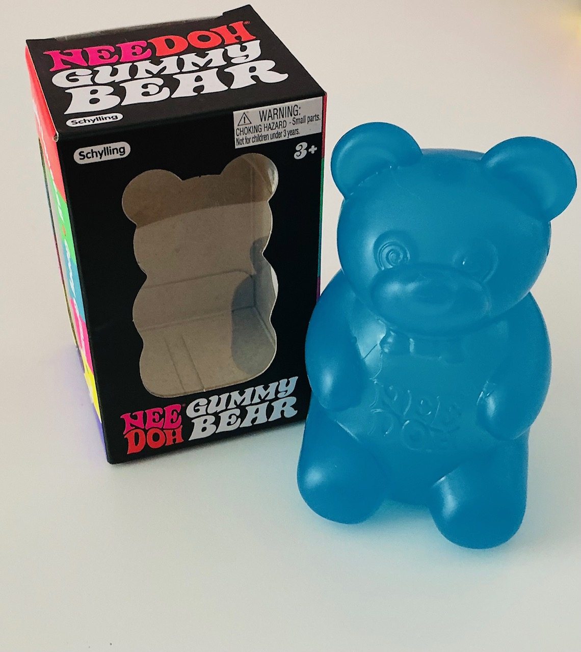 Household photograph of a blue NeeDoh Gummy Bear